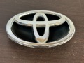 Эмблема решетки радиатора Toyota Corolla E120 2001-2006