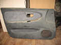Обшивка двери передняя левая Mitsubishi Lancer (CB) 1992-2000