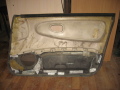 Обшивка двери передняя левая Mitsubishi Lancer (CB) 1992-2000