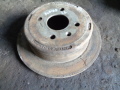 Диск тормозной зад.Daewoo Nubira 1997(серебро)(96549630)