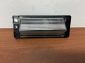 Фонарь подсветки номера правый Mitsubishi Aspire 1998-2003
