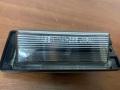 Фонарь подсветки номера правый Mitsubishi Aspire 1998-2003