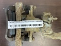 Суппорт задний левый Nissan Primera P12 2002-2008