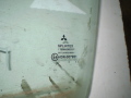 Стекло двери переднее левое Mitsubishi Pajero Pinin (H7) 1999-2006(MR523855)
