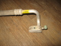 Трубка кондиционера Hyundai Accent II (+ТАГАЗ) 2000-2012 (9776325100)